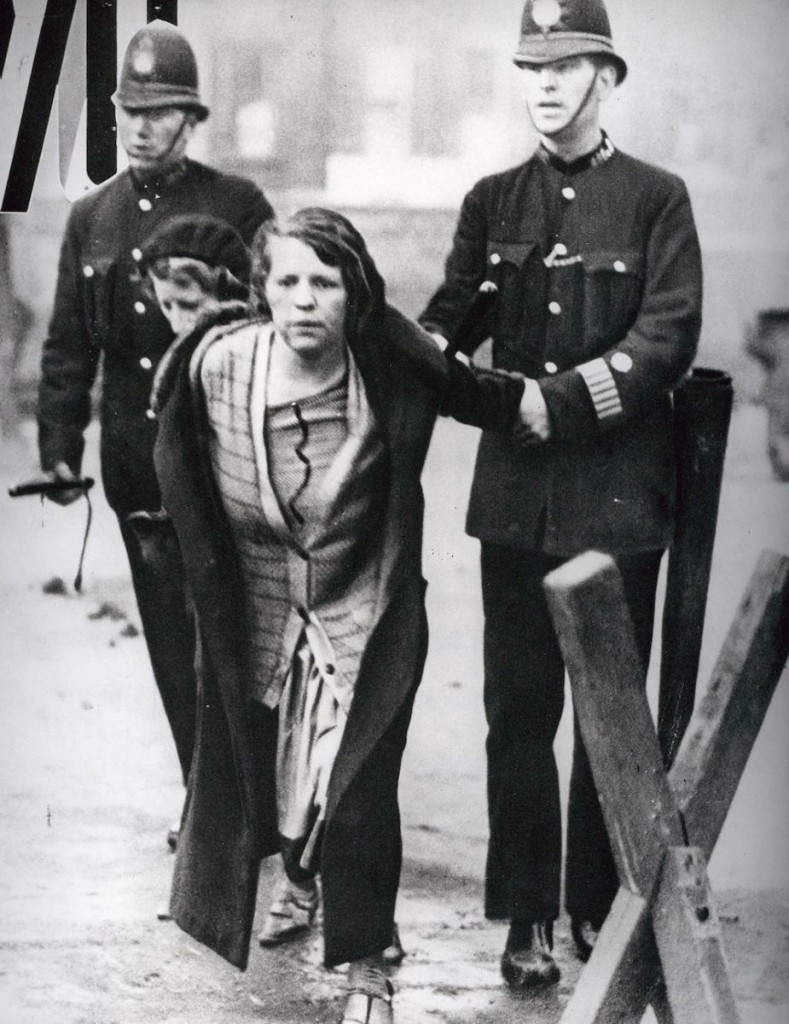Suffragette arrested by police